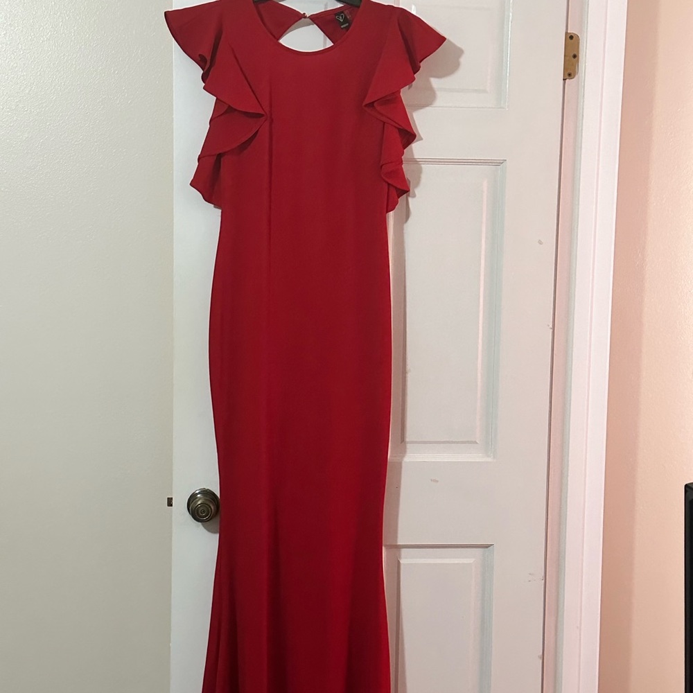 Long, formal red dress.